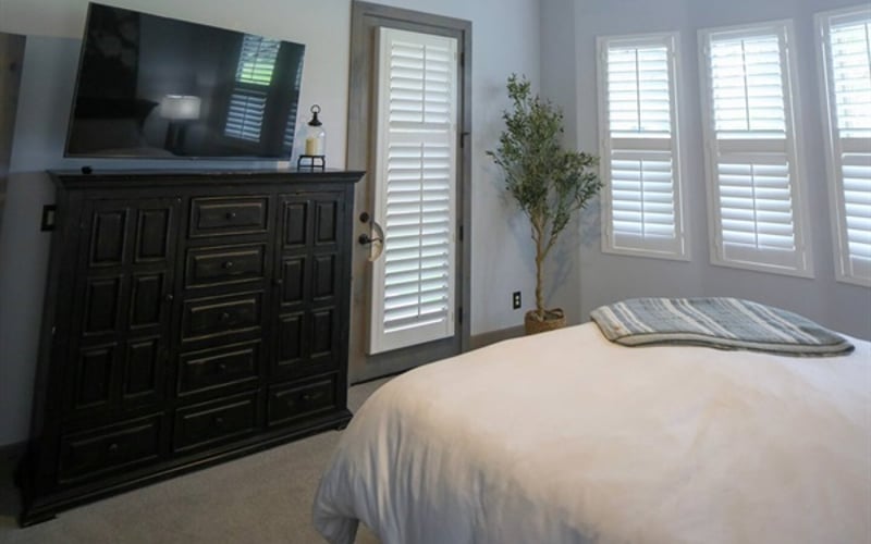 master bed with direct access to back patio
