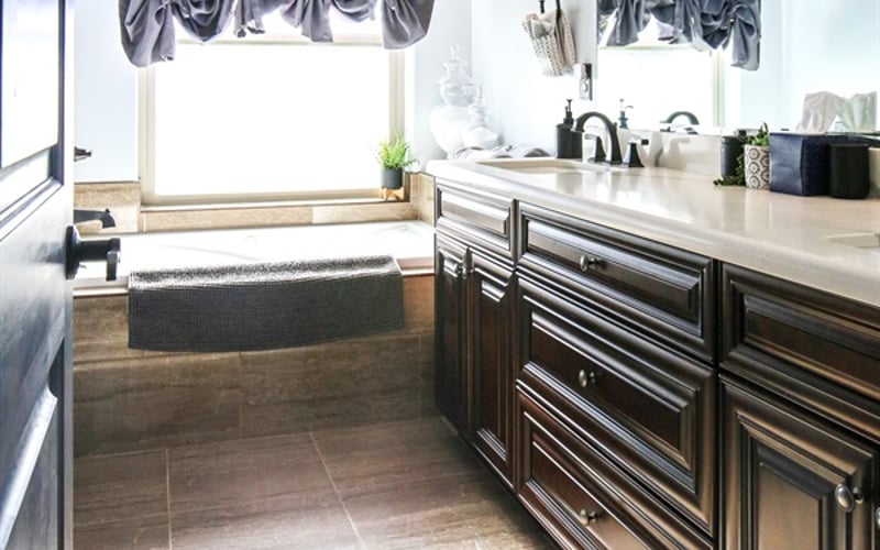Primary master bedroom with dual vanities and jetted tub
