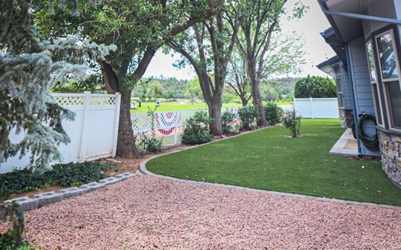 Soak in mountain air from the expansive back yard facing the golf course with mature trees and view of Payson Golf Course
